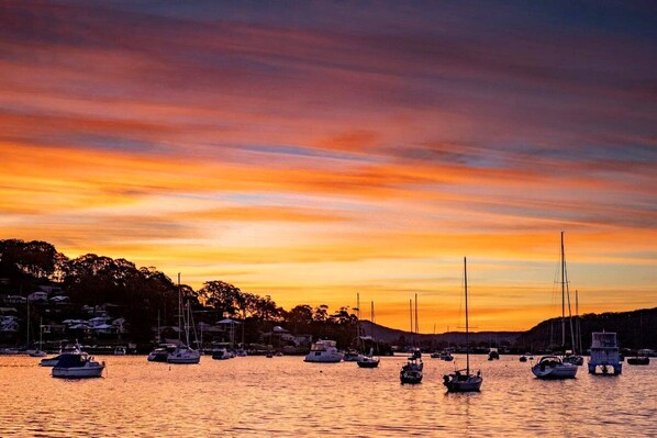 Enjoy serene harbor views from the comfort of your accommodations.