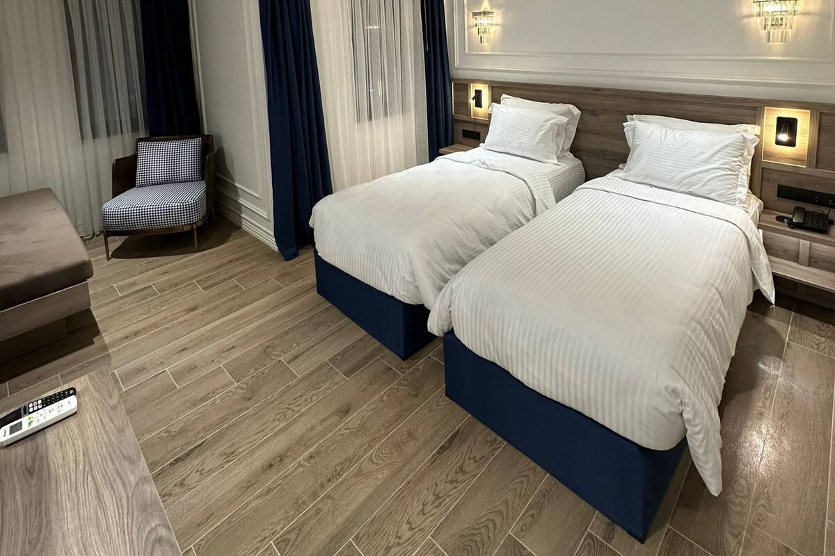 Tempur-Pedic beds, minibar, in-room safe, laptop workspace