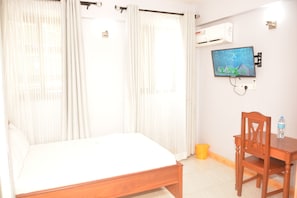 Habitación individual básica | Tabla de planchar con plancha y wifi gratis