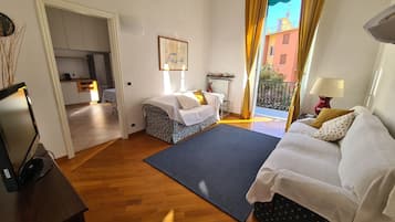 Appartamento City | Area soggiorno | Film pay-per-view