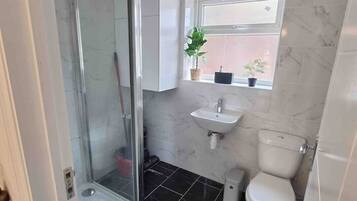 Shower, free toiletries, hair dryer, towels