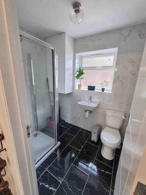 Shower, free toiletries, hair dryer, towels