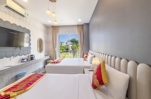Deluxe Triple Room, Balcony | Minibar, in-room safe, free WiFi, bed sheets