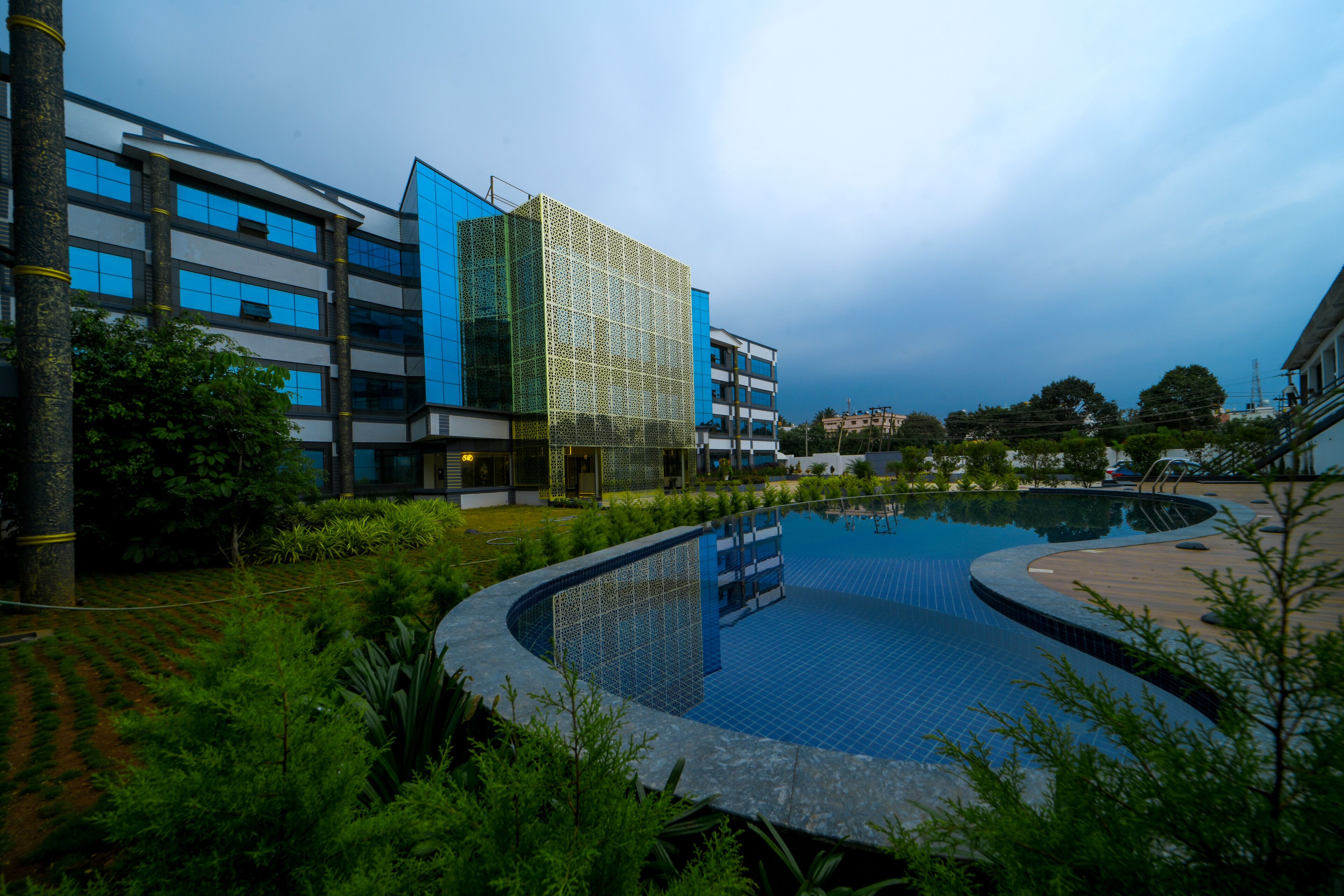 Outdoor pool, open 6:00 AM to 7:00 AM, pool umbrellas