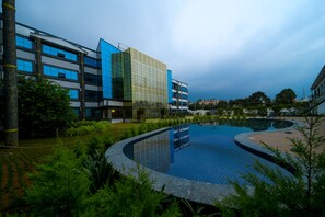 Outdoor pool, open 6:00 AM to 7:00 AM, pool umbrellas - Hotel Cn windsor (Chikkamagaluru)