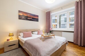 Apartment, 1 Bedroom, Kitchen | 1 bedroom, desk, laptop workspace, bed sheets - Daszyńskiego Apartment Cracow by Renters (Kraków)