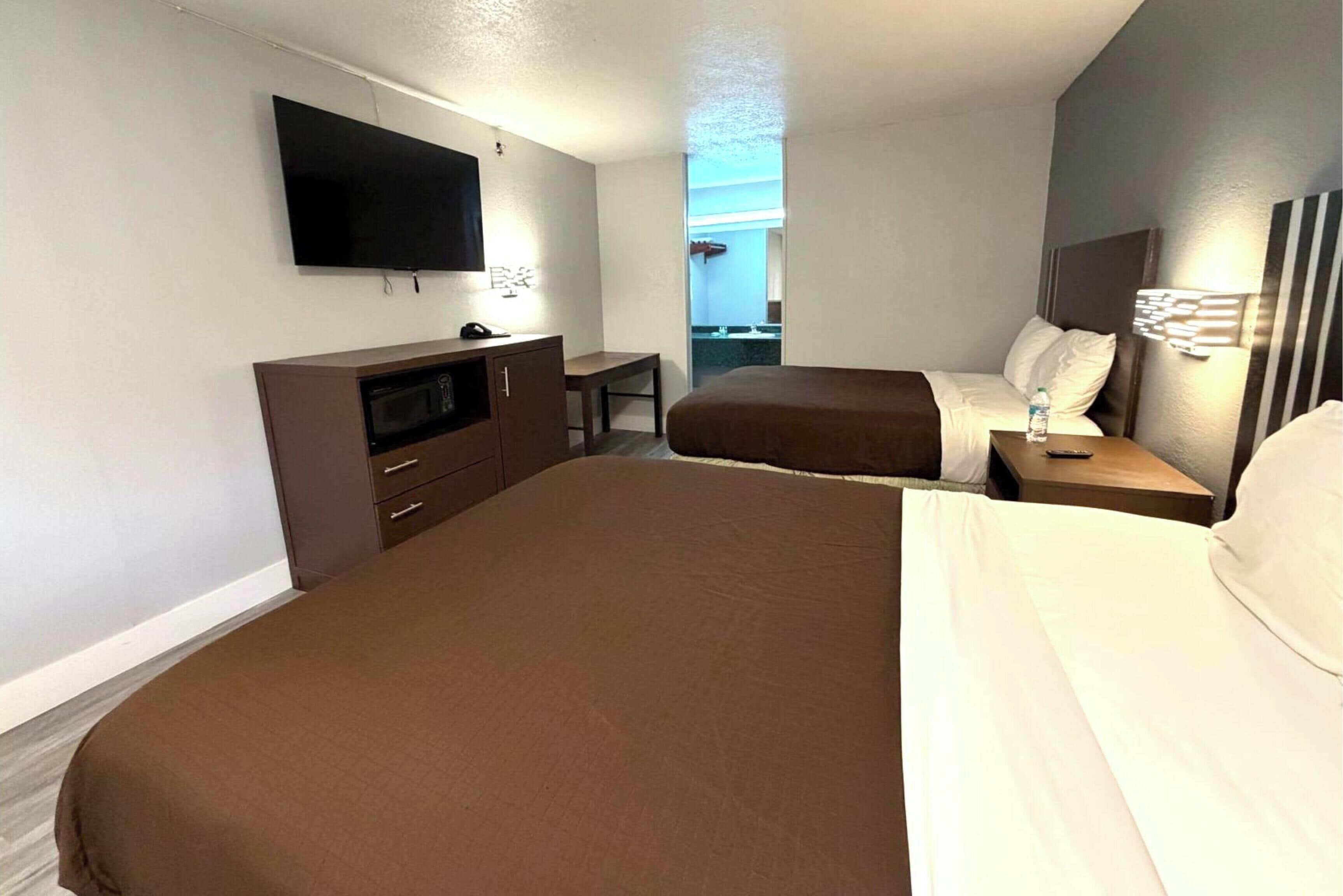 Room, 2 Queen Beds | Desk, free WiFi, bed sheets