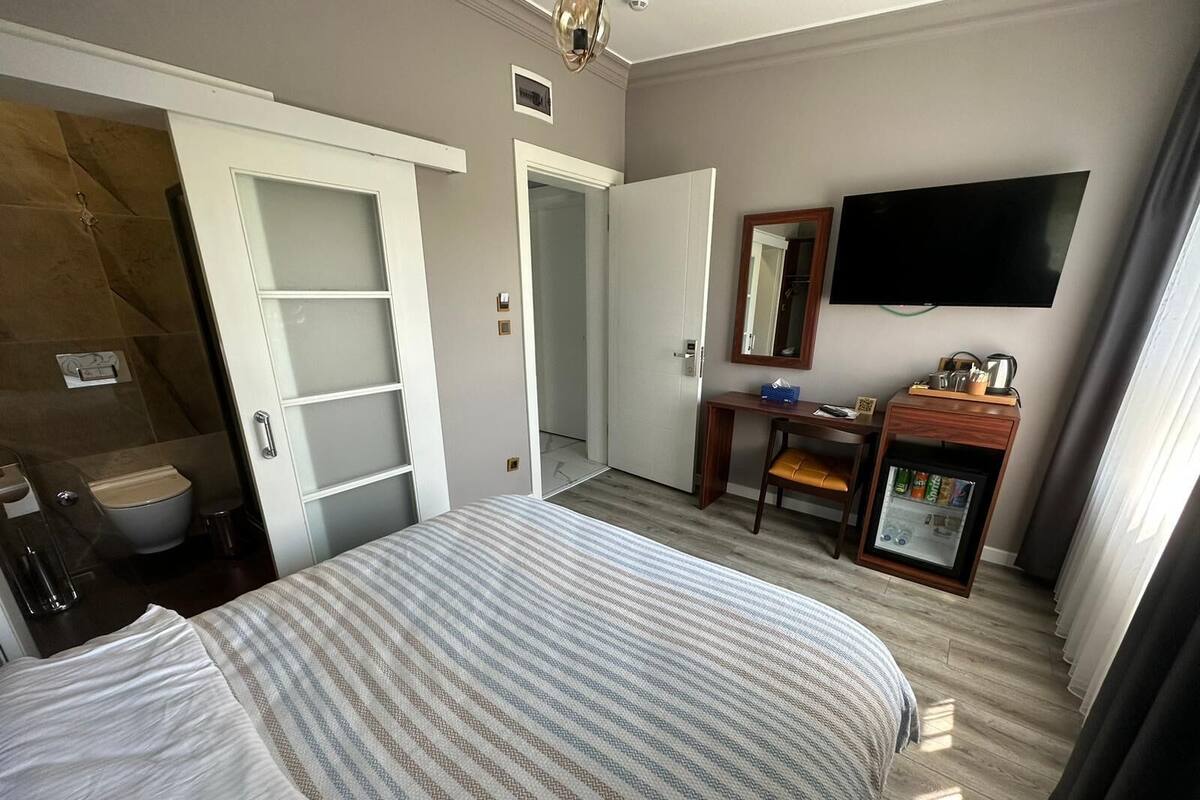 Habitación económica | 1 habitación, caja de seguridad en la habitación y insonorización