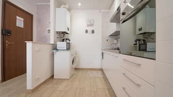 Fridge, oven, cookware/dishes/utensils