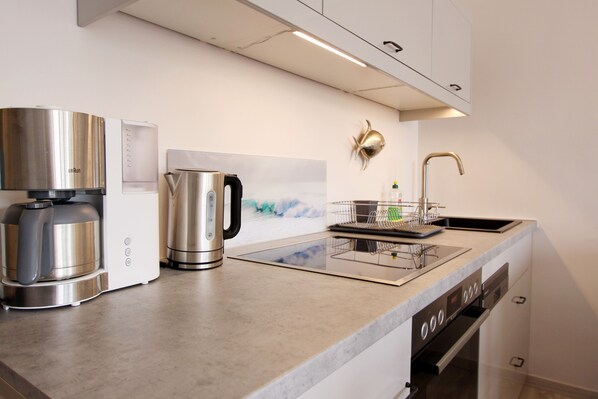 Réfrigérateur, four, plaque de cuisson, lave-vaisselle