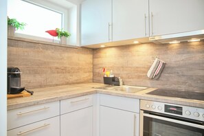 Geladeira, fogão, cooktop, lava-louças