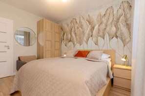 2 bedrooms, desk, iron/ironing board, travel crib