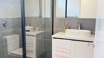 Hair dryer, towels, soap, shampoo