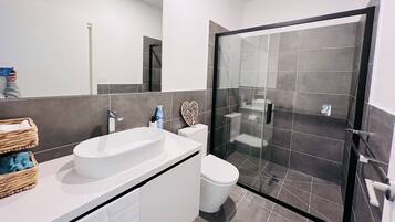 Hair dryer, towels, soap, shampoo