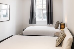 7 quartos, ferros/tábuas de passar roupa, Wi-Fi, roupa de cama