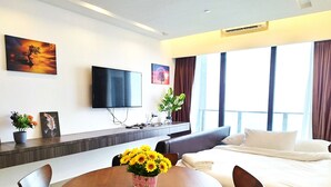 Apartamento Deluxe | Zona de estar
