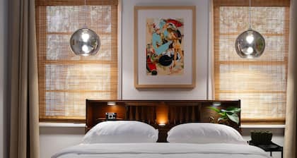 Steps to UNT - Art-Filled Mid-Century Retreat w/ Patios & Firelight