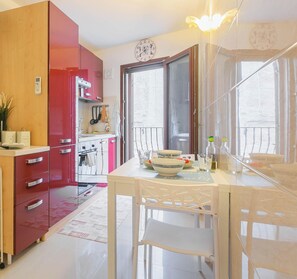 Fridge, oven, electric kettle, cookware/dishes/utensils