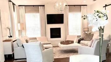 Smart TV, fireplace, table tennis, books