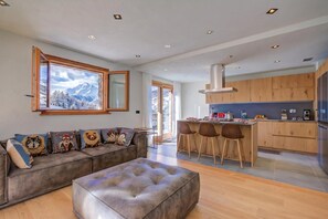 Family Chalet, Multiple Bedrooms (Chalet Merveille Ski In - Ski Out) | Living area | 21-inch Smart TV with digital channels - Chalet Merveille Ski In - Ski Out (Sauze d'Oulx)