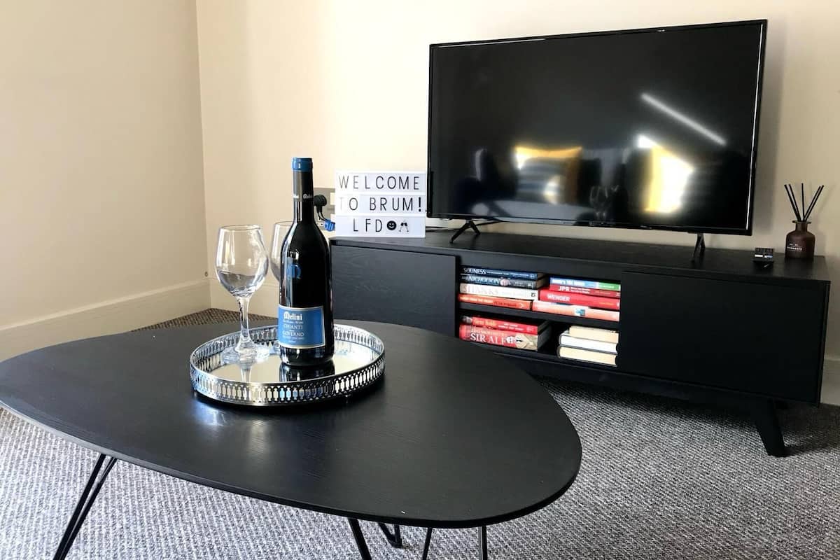 Apartamento City | Zona de estar