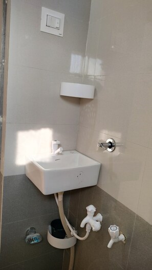 Dusj, håndklær og såpe