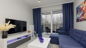 Unclassified image, 5 of 20, button - Dark Blue and Grey Apartment by Renters (Warsaw)