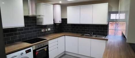 Fridge, microwave, stovetop, cookware/dishes/utensils