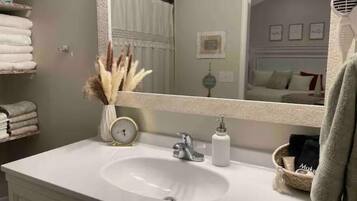 Jetted tub, hair dryer, towels, soap