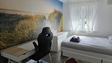 2 bedrooms, desk, iron/ironing board, travel crib