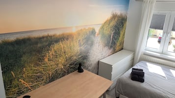 2 bedrooms, desk, iron/ironing board, travel cot