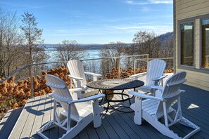 Outdoor dining - Sprawling lake home with wood fireplace, hot tub, game tables, sauna, & grill (McHenry)