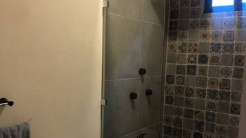 Shower, towels, soap, shampoo