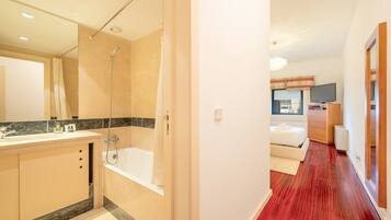 Hair dryer, towels, soap, shampoo
