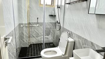 Shower, towels, soap, shampoo