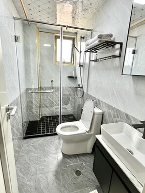 Shower, towels, soap, shampoo