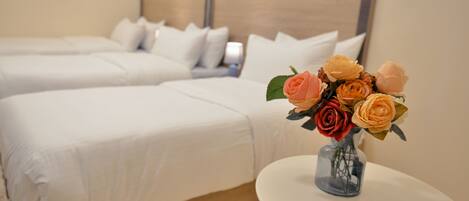 Chambre Triple Confort | Draps en coton égyptien, literie de qualité supérieure, bureau