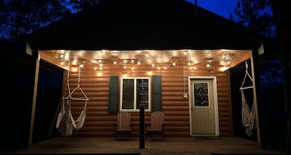 U.P. Woodsy Cabin Retreat: central location, sauna, AC, sleeps 13!
