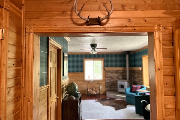 Antlers welcome you into the lounge. Enjoy a fire, puzzles, games, records, and the view.