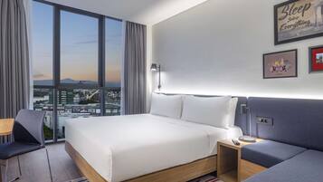 Room, 1 King Bed | Living area | 55-inch LCD TV with satellite channels