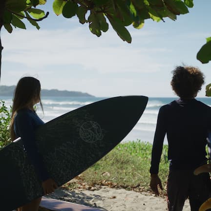 On the beach, white sand, beach umbrellas, beach towels