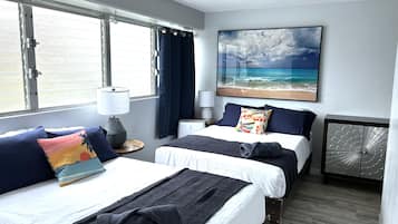 2 dormitorios, tabla de planchar con plancha, cuna de viaje