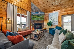 Smart TV, chimenea, futbolito y libros 