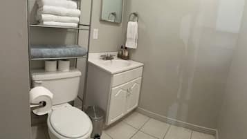 Hair dryer, towels, soap, shampoo