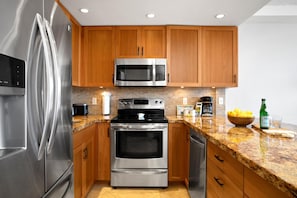 Condo (1 Bedroom) | Private kitchen | Fridge, microwave, oven, coffee/tea maker - The Whaler by KBM (Kaanapali)