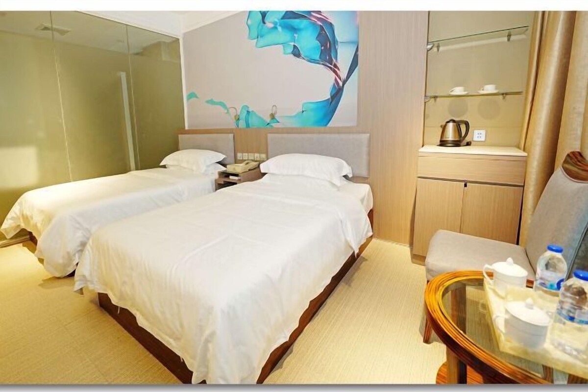 Premium bedding, down comforters, in-room safe, desk