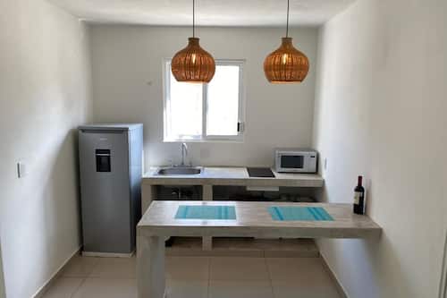 Family Apartment | Private kitchen | Stovetop, espresso maker, cookware/dishes/utensils