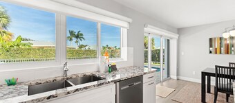 Snowbird-friendly home near water with private heated pool, grill, patio, & W/D