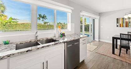 Snowbird-friendly home near water with private heated pool, grill, patio, & W/D