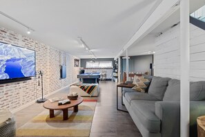 Smart TV, fireplace, video games, foosball